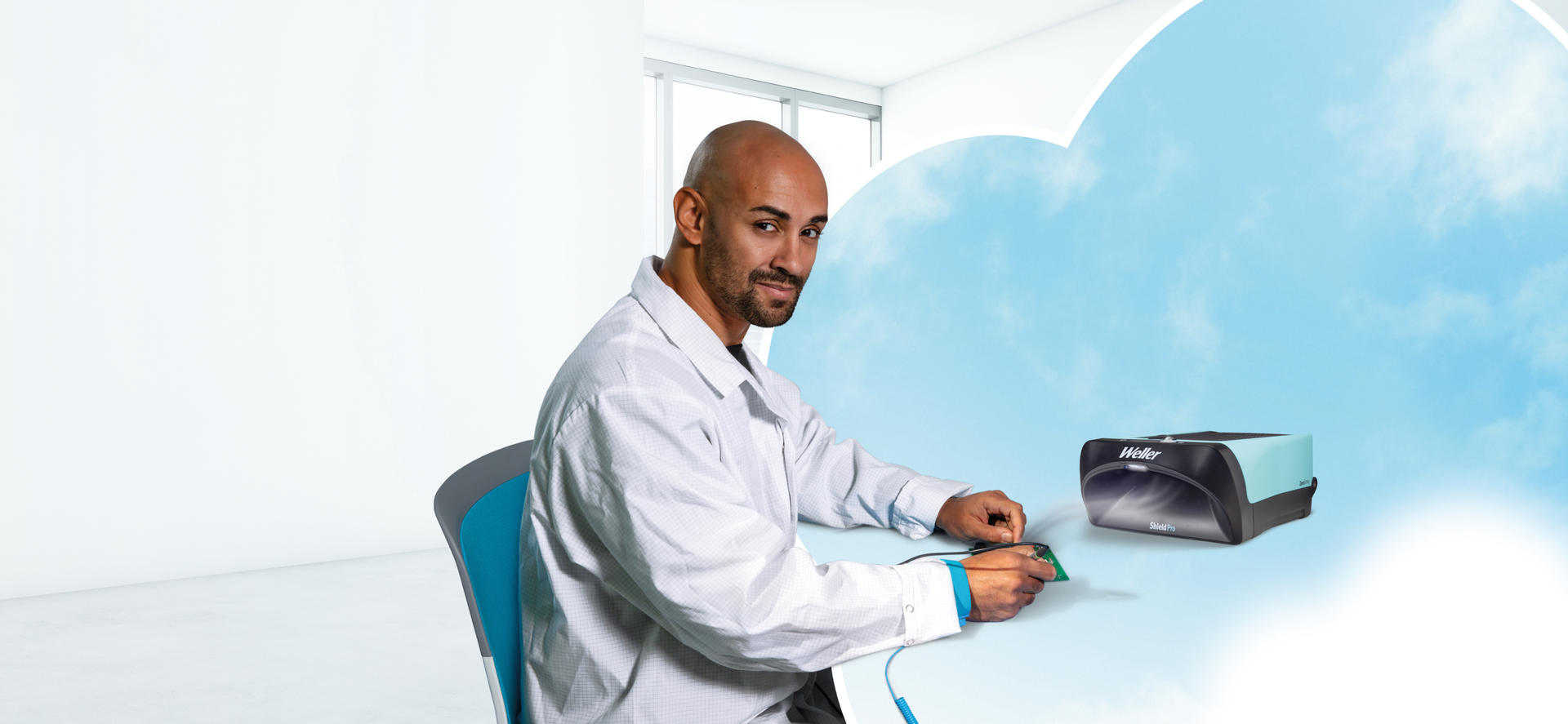 Soldering expert soldering with ZeroSmog Shield Pro fume extraction